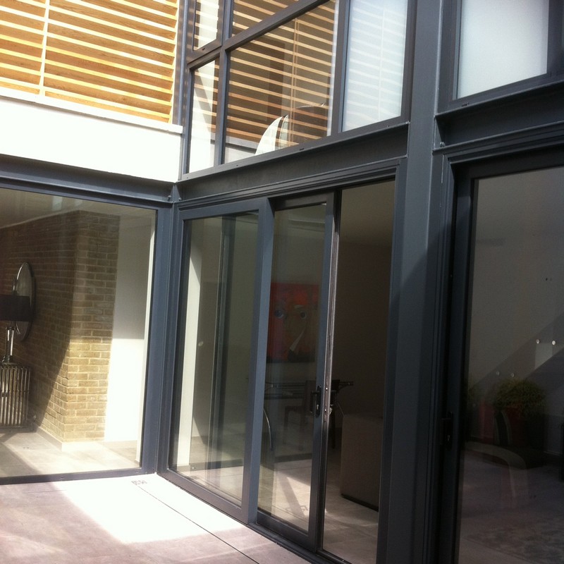 Anthracite aluminium sliding patio doors fitted in East Molesey